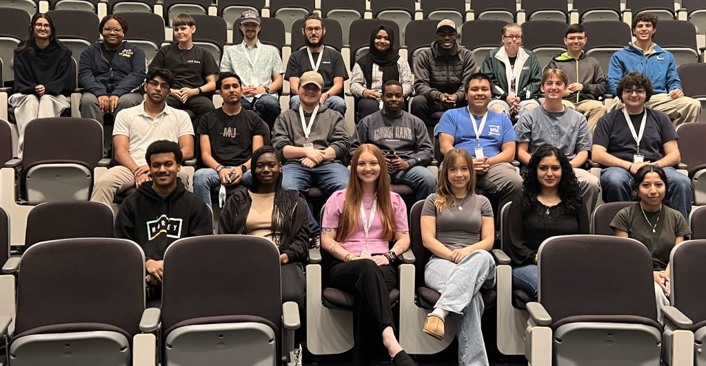 2025 interns sitting in auditorium