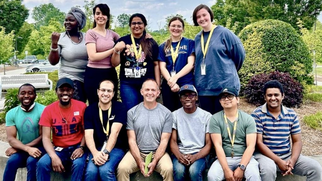Group of students and faculty at a park